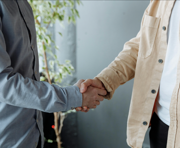 two men shaking hands