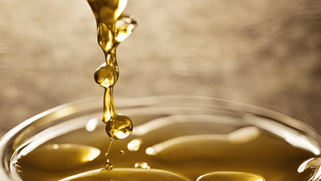 beautiful frying oil drops flowing into oil about to be filtered using a filter powder