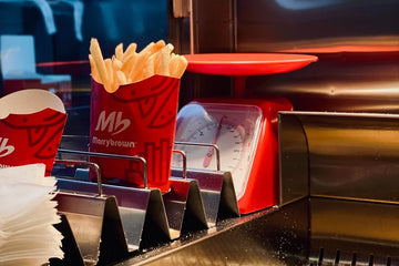 Fried French fries in a french fry holder