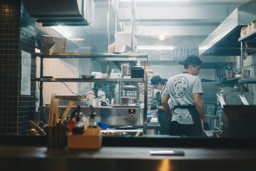 busy kitchen staff working hard at a restaurant making food